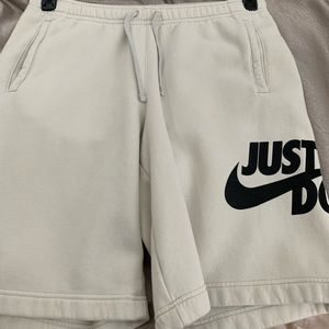 grey nike sweatpants shorts